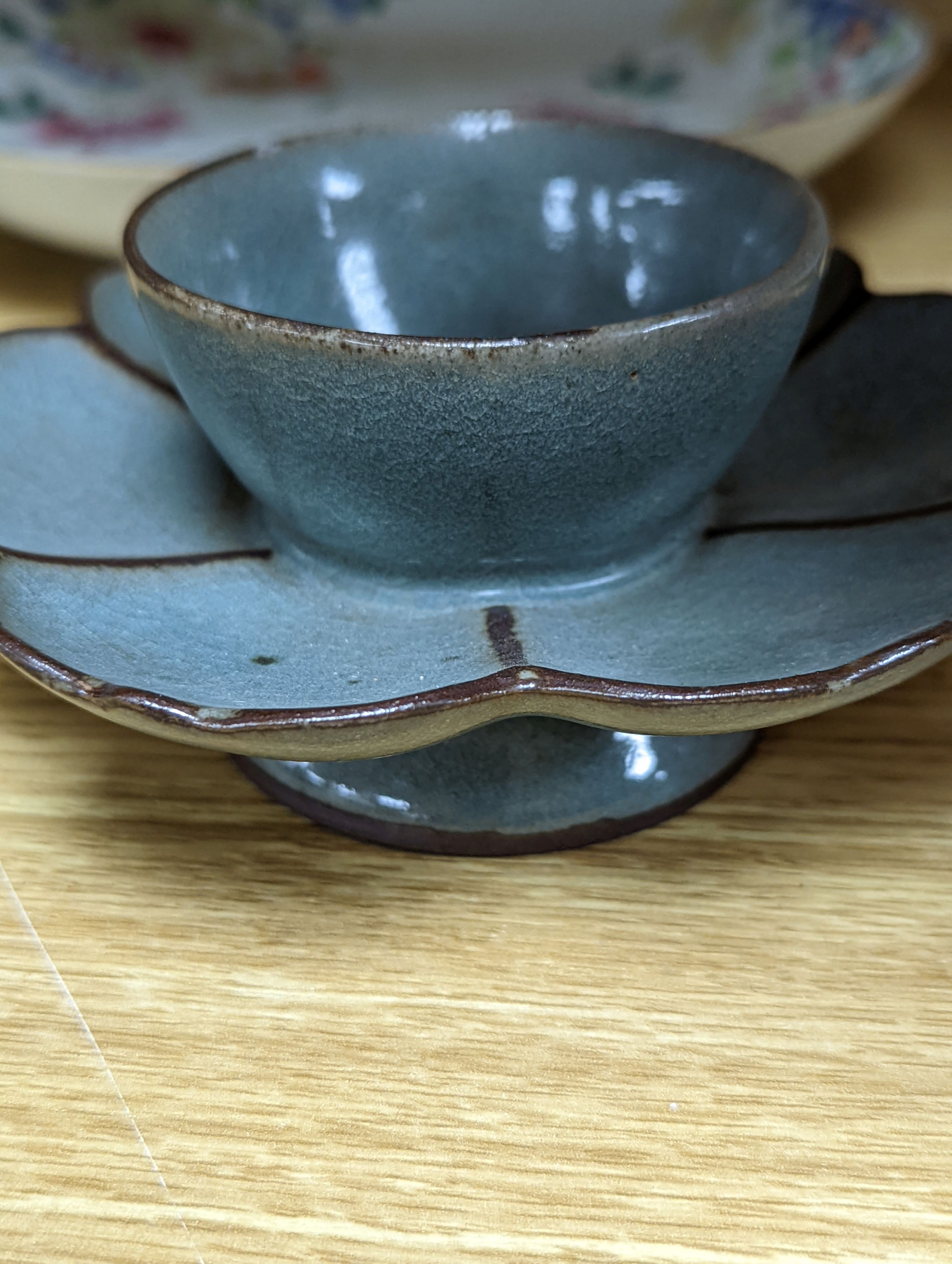 An 18th century Chinese famille rose dish, crackle-glaze stem cup, Beijing glass tea bowl and a Chinese Imari plate. Largest 24cm